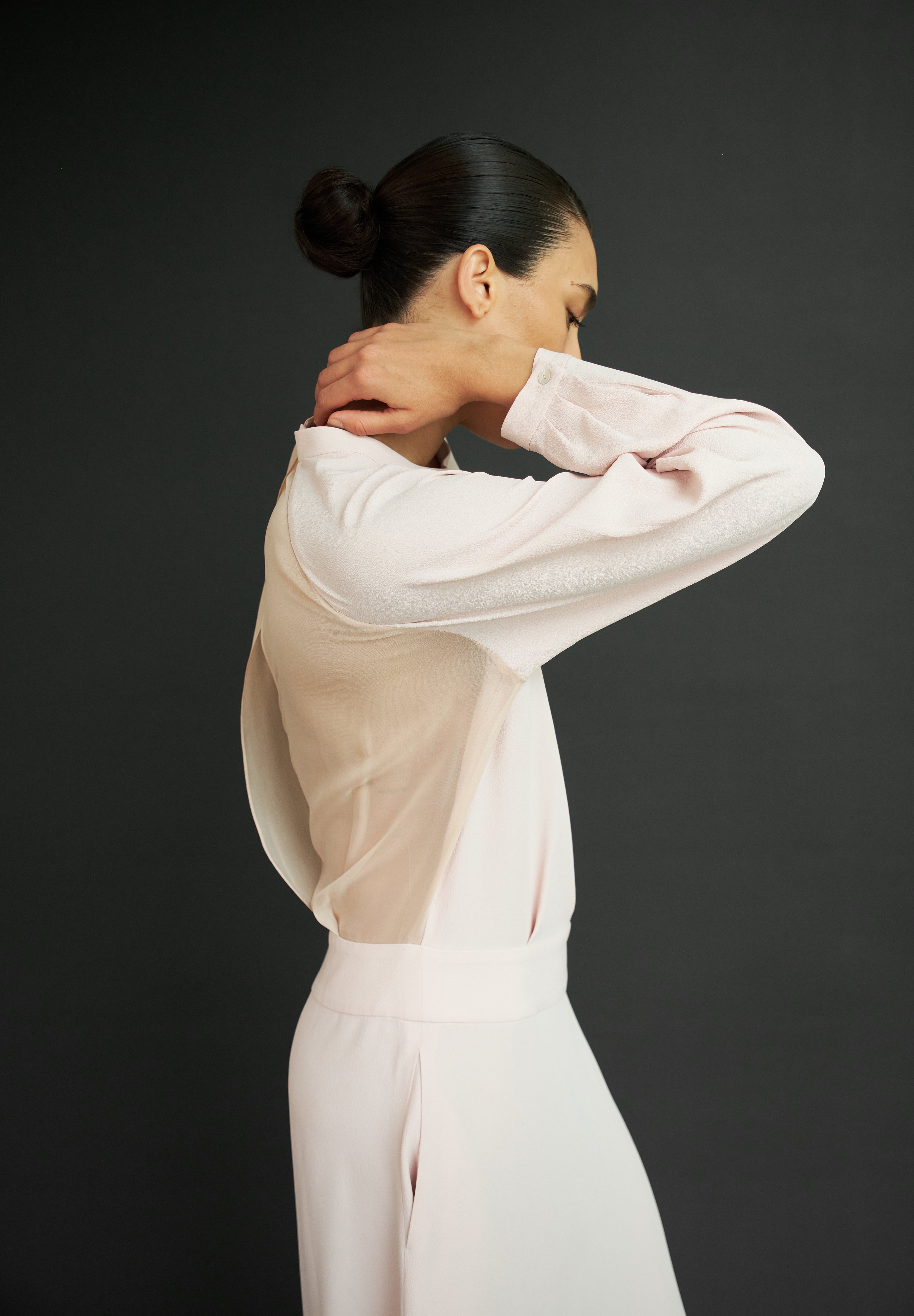 Woman in pink-cream-coloured garment